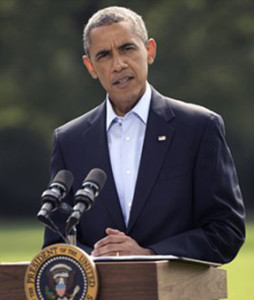 President Barack Obama speaks on the South Lawn of the White House in Washington about the ongoing situation in Iraq. 