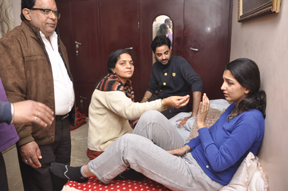 GHAZIABAD, INDIA  FEBRUARY 12: Snapdeal employee Dipti Sarna, who was missing since Wednesday evening, with her family after returning to home on February 12, 2016 in Ghaziabad, India. The 24-year-old Snapdeal employee had been missing since Wednesday night after she was last seen taking a shared auto-rickshaw from Vaishali Metro station to the Ghaziabad bus stand. She was allegedly kidnapped at knife-point after she took an auto in Ghaziabad. She told the police that the miscreants fed her on time, took care of her and she does not want to press charges. Just after the kidnapping, the police launched very extensive search operations. However, the girl called her parents at around 7 this morning and said she was on a train to Delhi. (Photo by Sakib Ali/Hindustan Times via Getty Images)