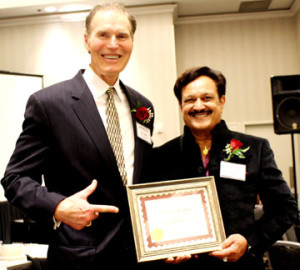NFL Alumni President Allan Kennedy and Honoree  Dr. Romesh Japra