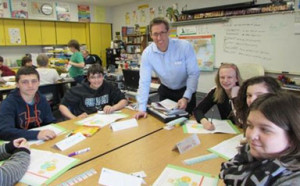 First Bank & Trust Commercial Banking Officer Ryan Bird works with  local Junior Achievement students