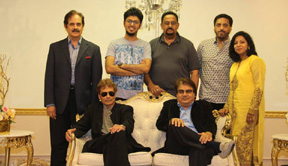 Standing from left: Arif Rizvi, Geetesh Iyer, Rajeshvar Singh of  Melody Makers, Vikas Singh, Ria Nilawar.  Seated Organizers from left: Peter Sahjani & Dahya Mistry