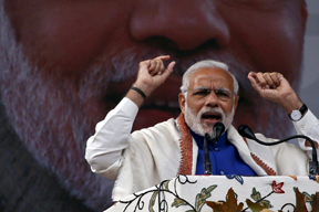 07 Nov 2015, Srinagar, India --- India's Prime Minister Narendra Modi addresses a rally in a cricket stadium in Srinagar, November 7, 2015. Modi pledged 800 billion rupees ($12.10 billion) in funds to bolster development and economic growth in Kashmir, a year after the worst flooding in more than a century destroyed half a million homes there. REUTERS/Danish Ismail --- Image by © DANISH ISMAIL/Reuters/Corbis