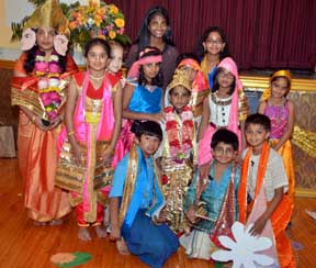 Kids dress up for Krishna Jayanti celebrativos.