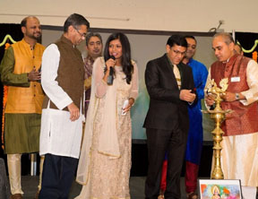 Indian Consul O P Meena lighting the lamp when the  Gayatri Mantra was recited.