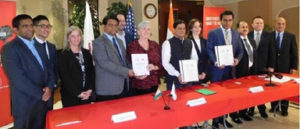 MoU signers with other members of Illinois government, Minister KT Rama Rao and CG Dr Ausaf Sayeed 