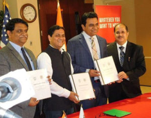MoU signatories L to R Arvind Kumar, Hardik Bhatt with Minister  KT Rama Rao and CG Dr Ausaf Sayeed