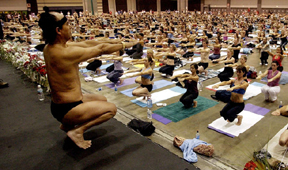 Bikram Choudhury, front, founder of the Yoga College of India, leads a class at the Yoga Expo 2003 at the Los Angeles Convention Center.