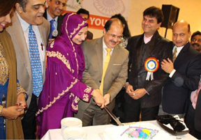 Dr Sayeed with his elegant wife Ms Faraha seen cutting cake