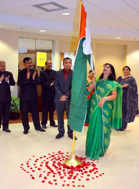 Indian CG Neeta Bhushan unfurling Indian Flag commencing the celebrations