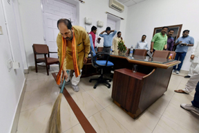 Armed with broom UP Minister cleans office corridor