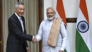 Prime Minister Narendra Modi shakes hand with Singapores Prime Minister Lee Hsien Loong