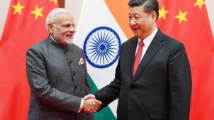 Prime Minister Narendra Modi shakes hands with Chinese President Xi Jinping during the 18th Shanghai Cooperation