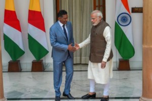 Prime Minister Narendra Modi shakes hands with Seychelles President Danny Antoine Rollen Faure