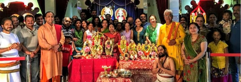 Temple Deities with devotees