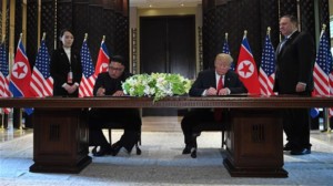 Trump Kim sign comprehensive document after historic summit