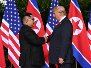 U S President Donald Trump shakes hands with North Koreas leader Kim Jong Un