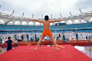 Baba Ramdev performed yoga with participants during the practice session of International Day of Yoga