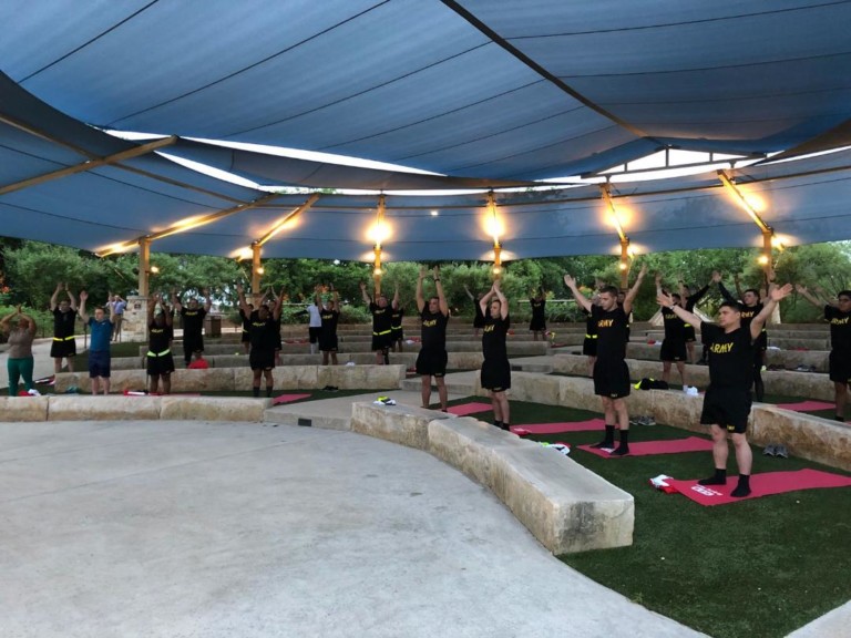 Veterans and military personnel practicing yoga in San Antonio