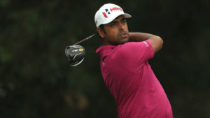Lahiri tied 7th after flying start Woods 14th