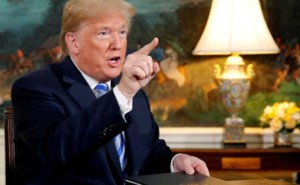 Trump warns countries doing business with Iran