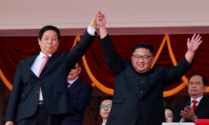 North Korean leader Kim Jong un right and Chinas Li Zhanshu