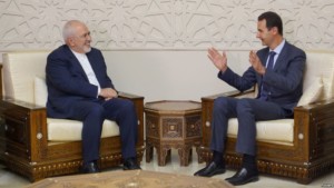 Syrian President Bashar al Assad meets with Irans Foreign Minister Mohammad Javad Zarif in Damascus