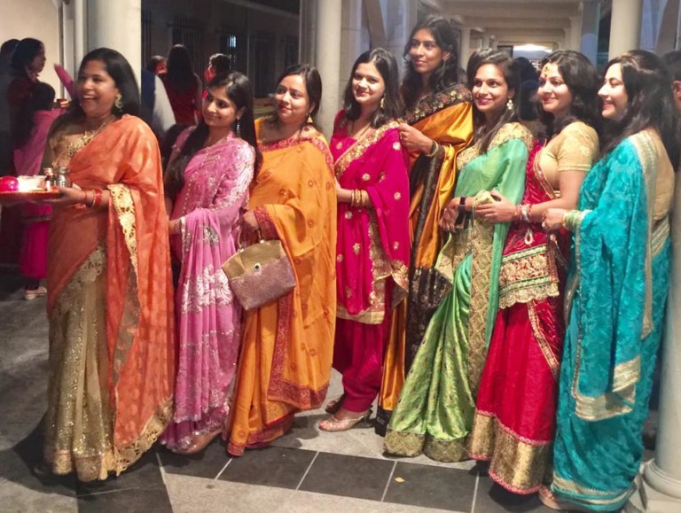 Karwa Chauth attended by ladies in colorful clothes