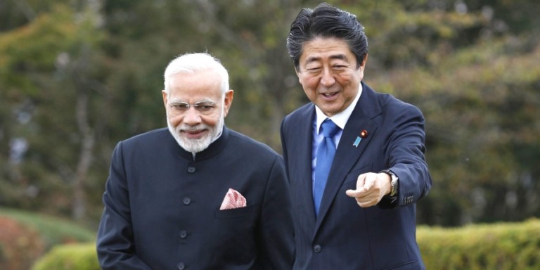 Prime Minister Narendra Modi left and Japans Prime Minister Shinzo Abe