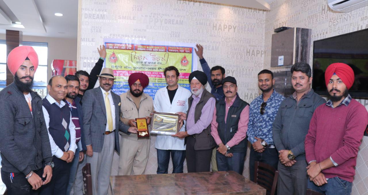 Dr Sarabjit Rajan (center), alongwith others, being honored with Pride of Phagwara award by Punarjot’s international coordinator Ashok Mehra