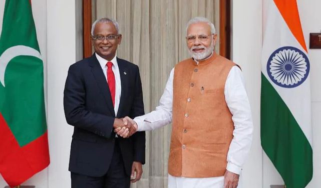 Prime Minister Narendra Modi shakes hands with Maldivian President Ibrahim Mohamed Solih