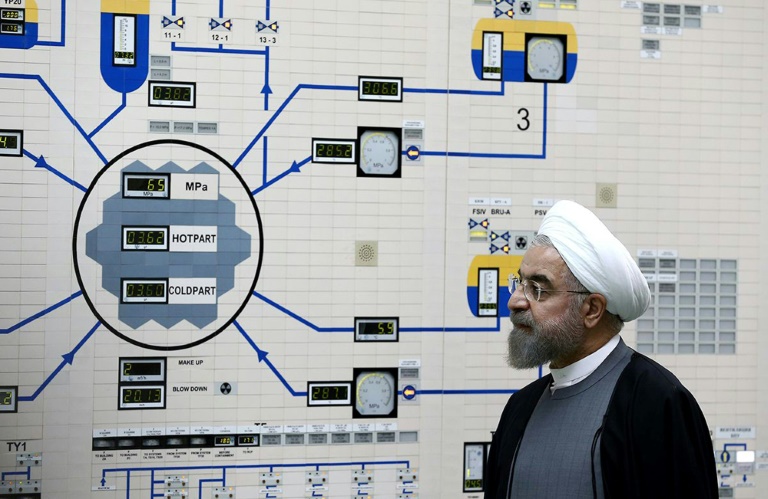 Iran suspends nuclear deal curbs in push for relief from US sanctions