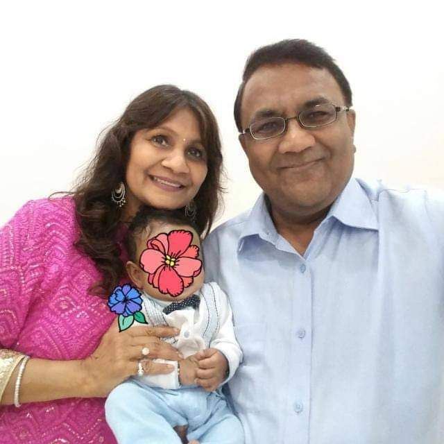 Sangeeta Gala and her husband Rajesh Gala with a baby they foster