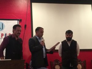 Assemblymember Ash Kalra speaks while Dr. Romesh Japra (left) and Mr. Rohit Rathish (right) listen