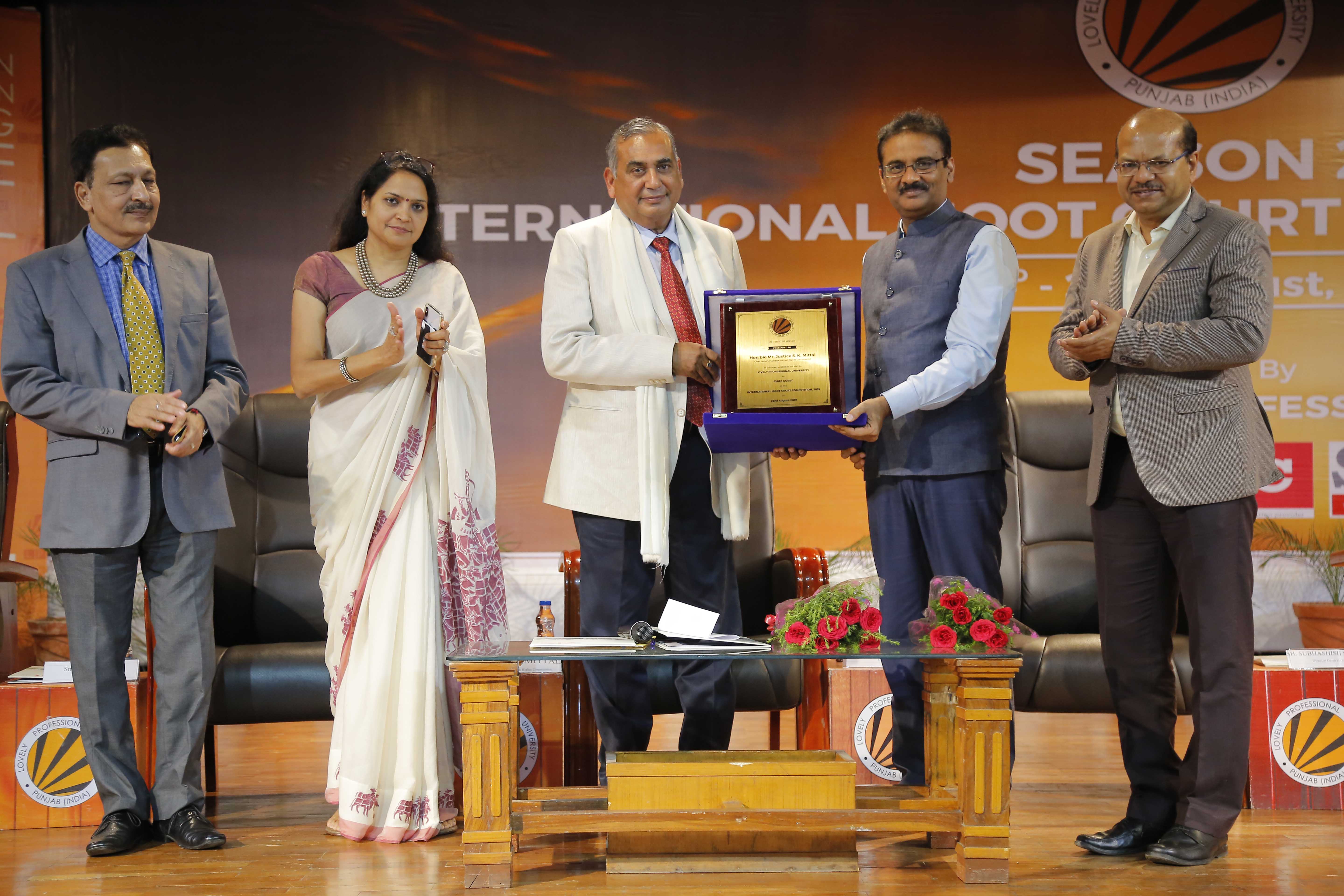 LPU Chancellor Mr Ashok Mittal honouring Former Chief Justice Sh SK Mittal during International Moot Court Competition at LPU