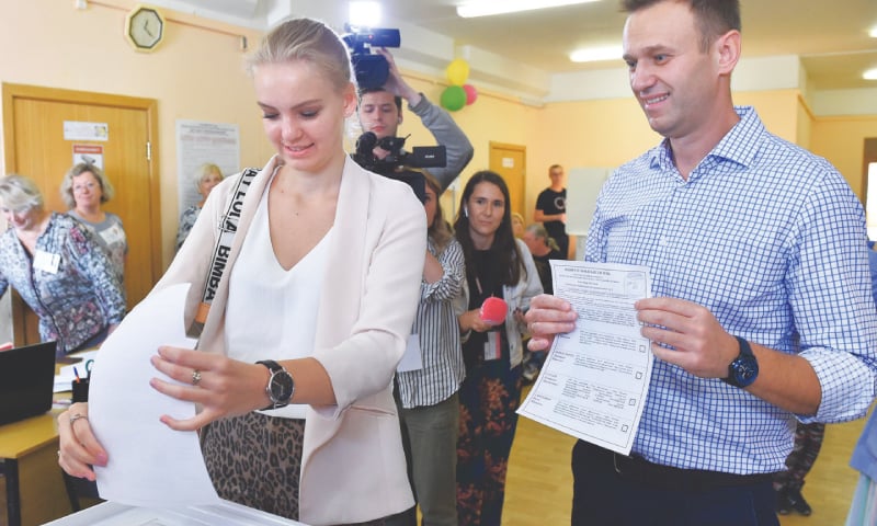 Russians go to polls in test for Putin allies