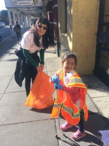 Patrick's little daughter volunteers to clean up trash