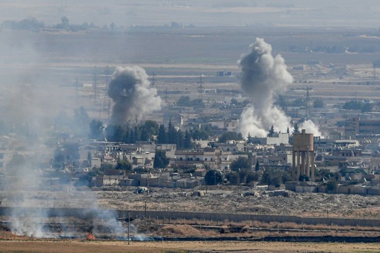 Syria Kurds defend key town as Turkey ignores US