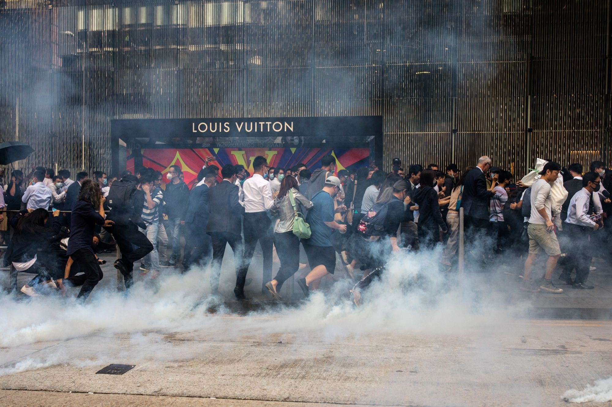 Police shoot protester, man set alight in day of Hong Kong fury