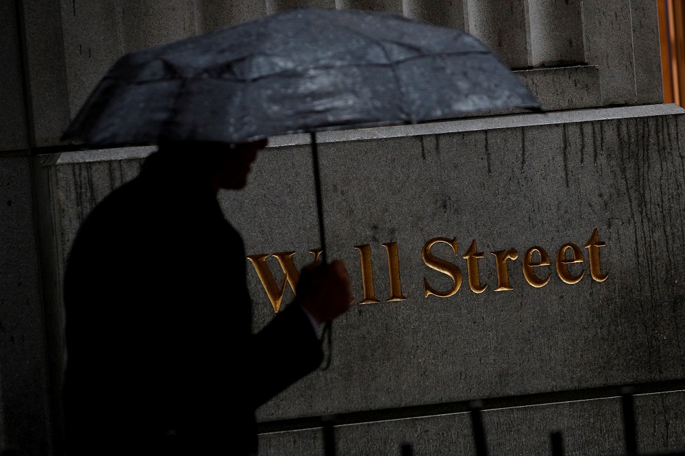 Wall Street retreats from records in light holiday trade