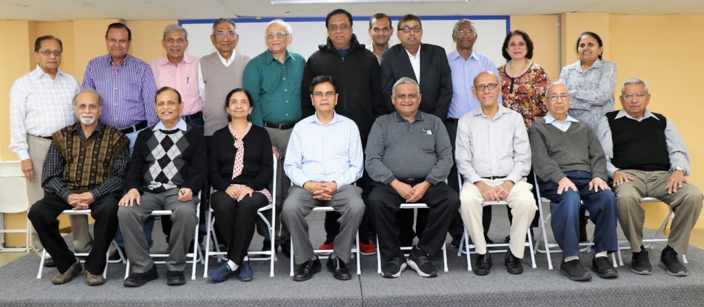 Newly elected Bhartiya Seniors of Chicago team for the year 2020-21 First Row On the Chair from L to R - Pravin Amin, Jayanti Oza, Rakshika Anjaria, Haribhai Patel, Indubhai Vaghani, Madarsang Chavda, Madhusudan Patel, Babubhai Laheri. Second Row Standing from L to R- Bhupendra Shah, Chandu Dave, Vishnu Patel, Pinakin Patel, Chandrakant Patel, Raman Patel, Arun Shah, Amrit Patel, Shilpa Desai, and Jyotsna Patel