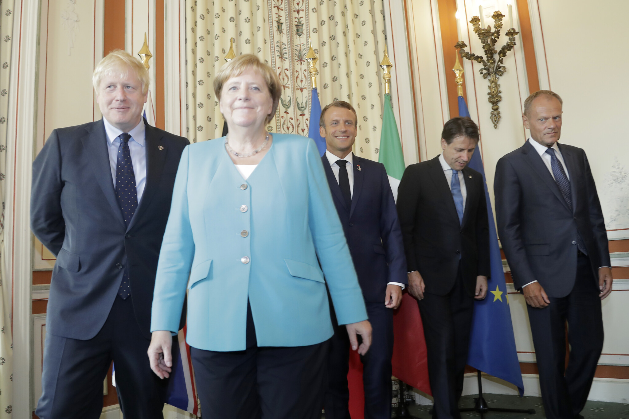 Merkel, Macron, Johnson urge Iran not to flout nuclear deal