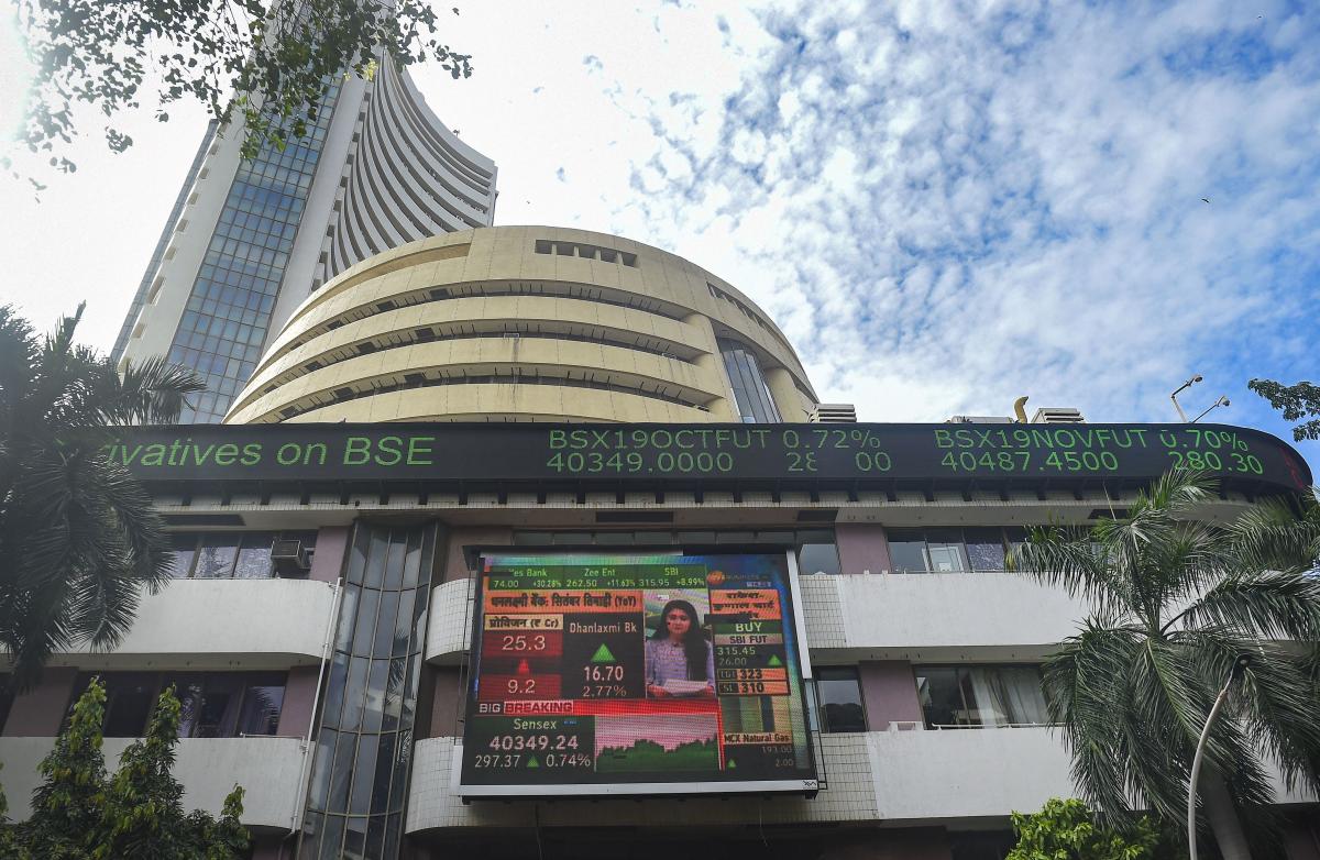 Sensex jumps over 200 pts; Nifty reclaims 12,200