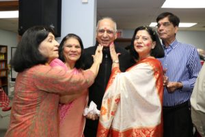 Founder Dr. ShukhdevjiSoni playing Holi with participants