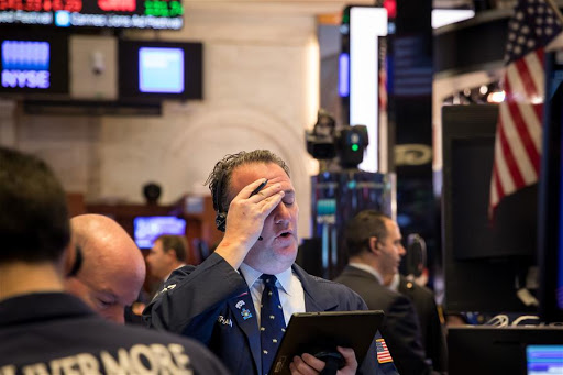 Wall St tumbles, Dow below 20,000 amid COVID-19 fears