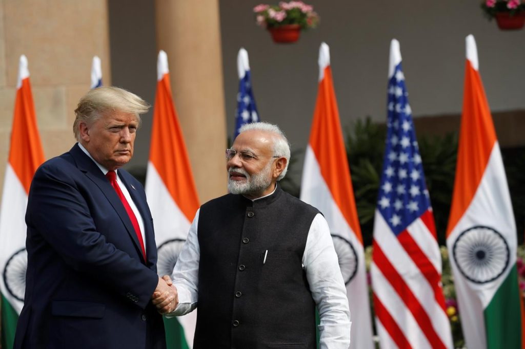 U.S. President Donald Trump and Indian Prime Minister Narendra Modi shake hands before their meeting at Hyderabad House in New Delhi, India, Tuesday, Feb. 25, 2020. (AP Photo/Alex Brandon)
