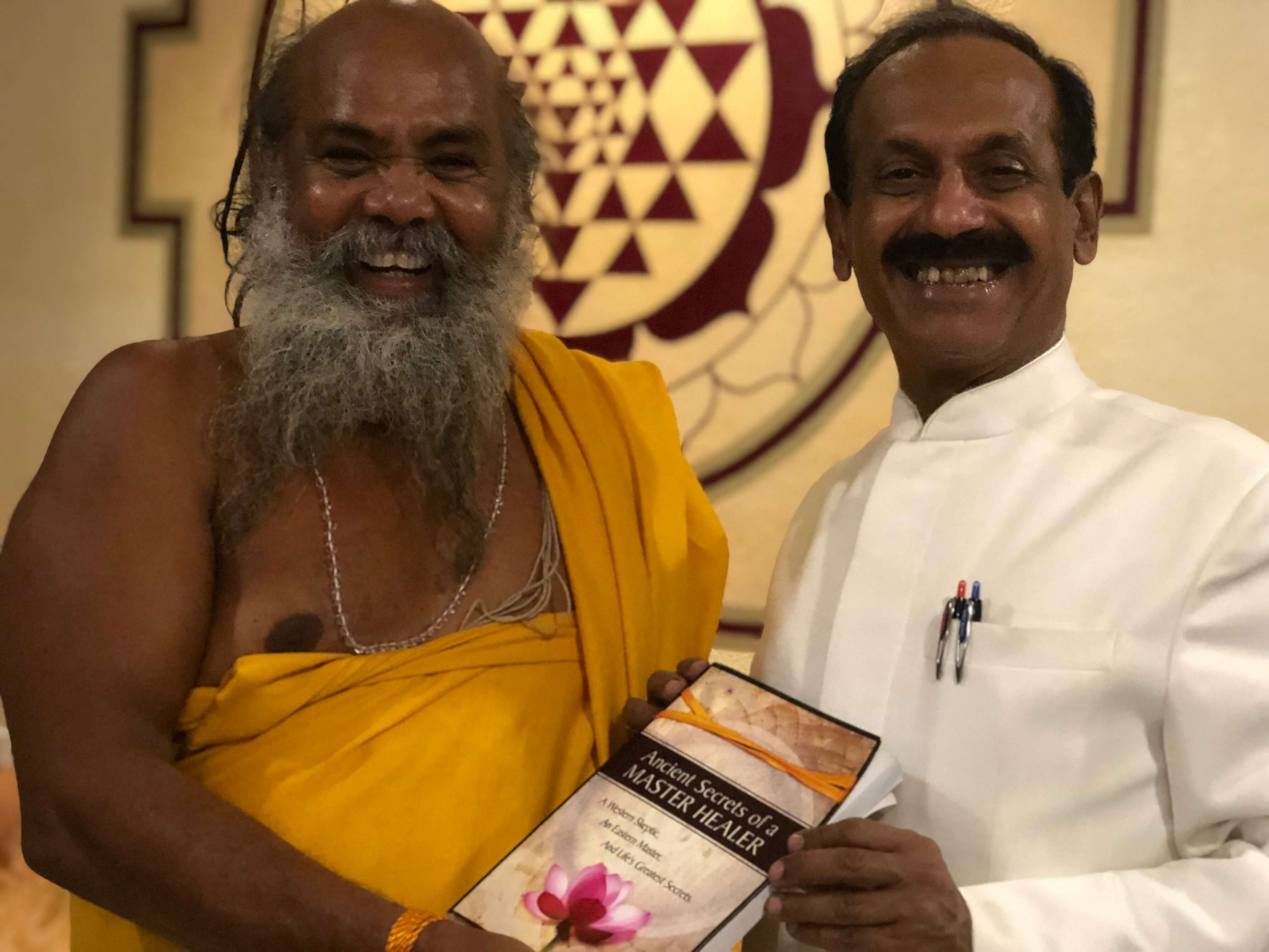 Dr Naram and Swami Omkar With Book