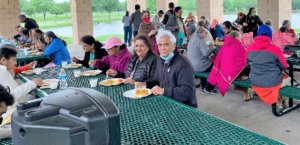 ujarati Senior Society of Plano members enjoying delicious dinner.