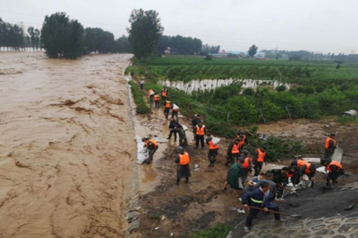 Death toll from floods in China's Henan reach 302