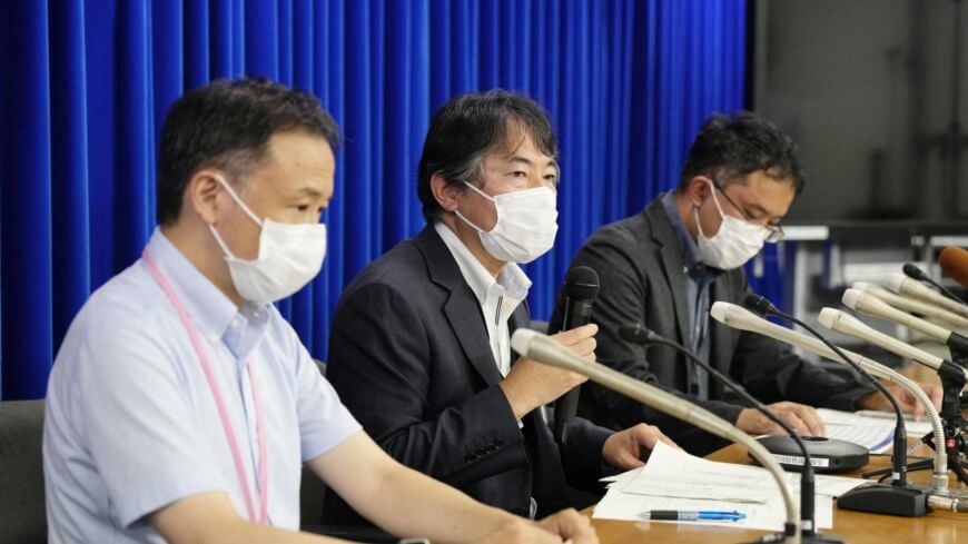 Japan's Director General of the Tuberculosis Infectious Diseases Division of Health Ministry Masanori Imagawa and other officials attend a news conference on the first confirmed monkeypox infection in Japan, in Tokyo, Japan July 25, 2022. Kyodo via REUTERS ATTENTION EDITORS - THIS IMAGE WAS PROVIDED BY A THIRD PARTY. MANDATORY CREDIT. JAPAN OUT. NO COMMERCIAL OR EDITORIAL SALES IN JAPAN