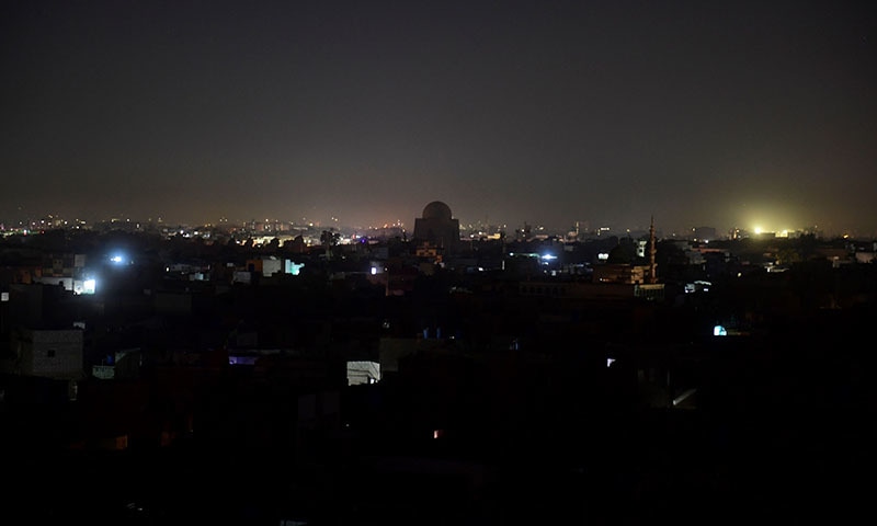 A general view shows Pakistan's port city of Karachi during a power blackout early on January 10, 2021. (Photo by Asif HASSAN / AFP)